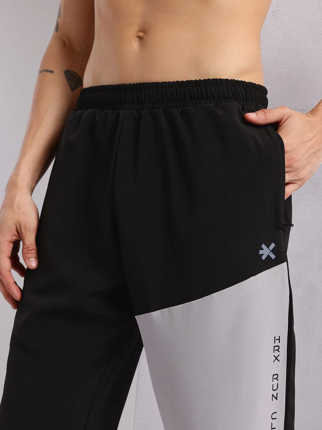 HRX by Hrithik Roshan Men Colourblocked Mid-Rise Running Track Pants - Image 6