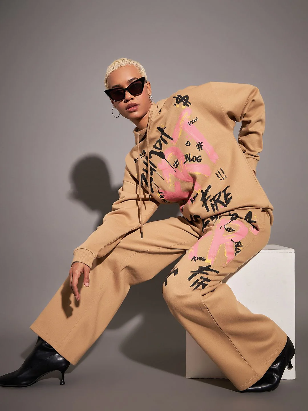 SASSAFRAS Women Beige Relaxed Fit Mid-Rise Typography Printed Fleece Track Pants - Image 4