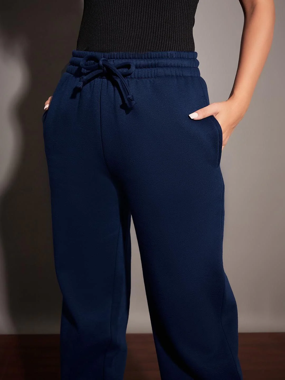 SASSAFRAS Women Navy Blue Relaxed Fit Mid-Rise Fleece Joggers - Image 7