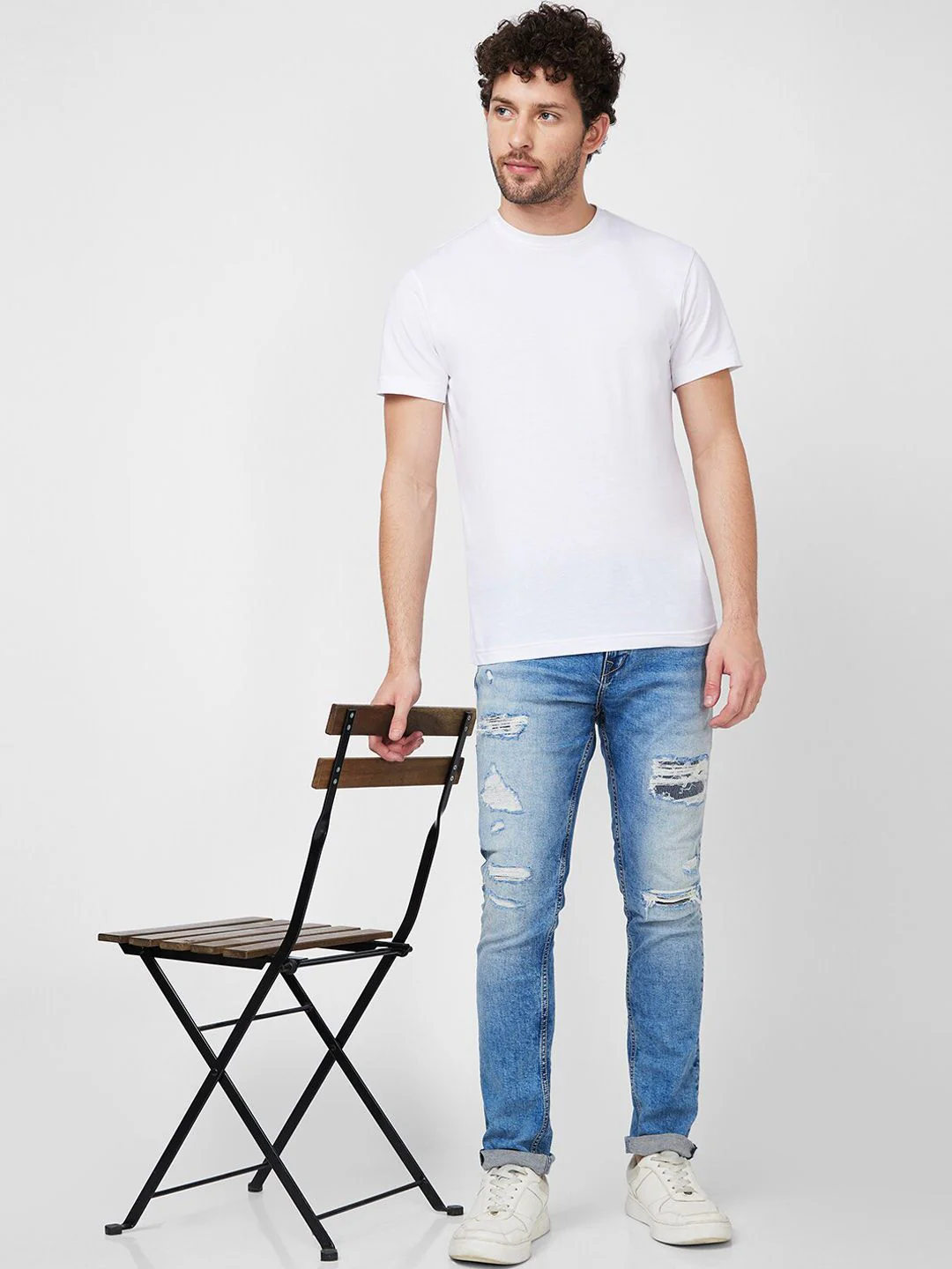 SPYKAR Men Skinny Fit Low-Rise Highly Distressed Heavy Fade Stretchable Cotton Jeans - Image 4