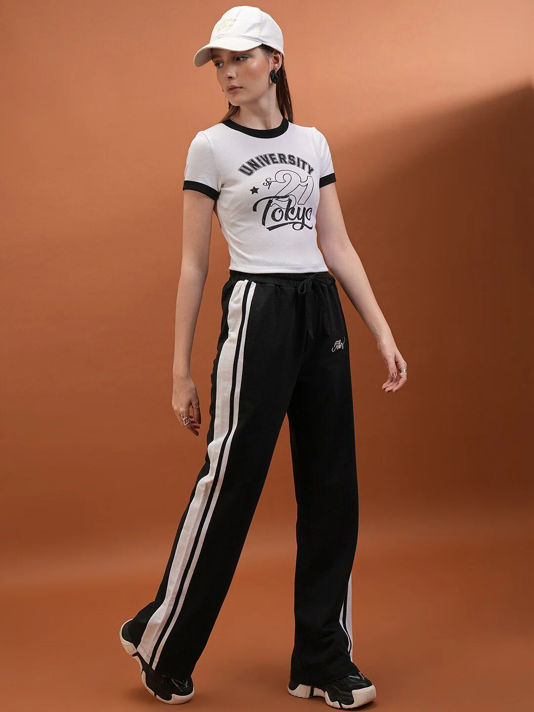 Tokyo Talkies Women Black Flared-Fit Mid Rise Track Pants - Image 4